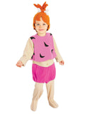 Child wearing Wilma Flintstone deluxe costume with white dress, orange wig and pebble necklace
