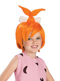Child wearing a pink costume with orange wig on a white background