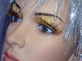 Gold tinsel false lashes, jagged in length