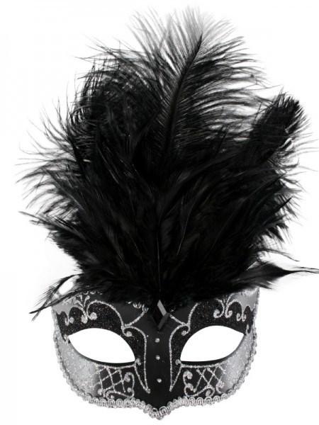 Black and silver Venetian style women's masquerade mask with tie up ribbon and black feathers